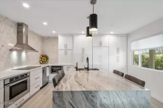 More Details about MLS # 6624482 : 6805 E 2ND STREET#1