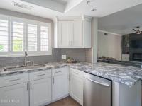 More Details about MLS # 6455615 : 10101 N ARABIAN TRAIL #1039